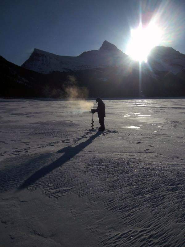 Ice Fishing First Time Spray Lakes by Canmore, Alberta