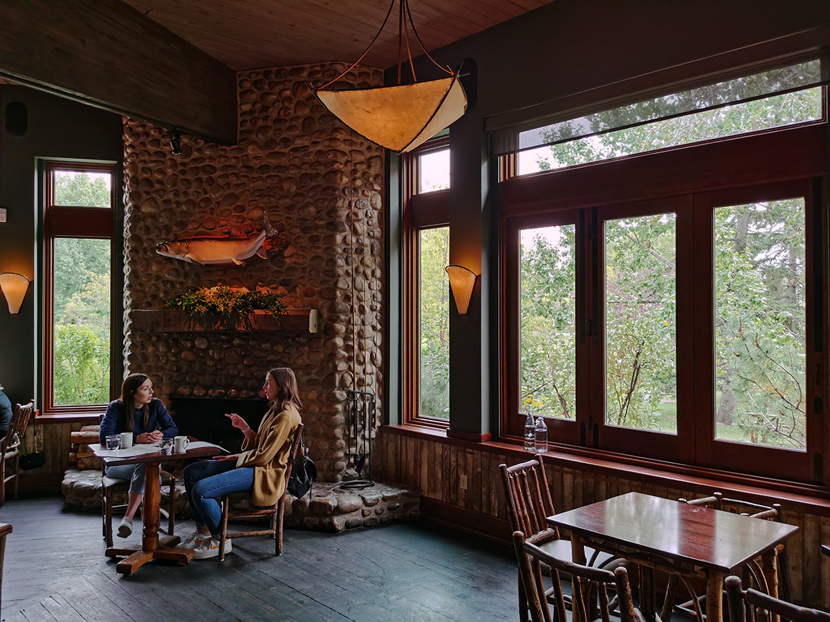 River Café At Prince's Island Park Stone fireplace with rustic interior 